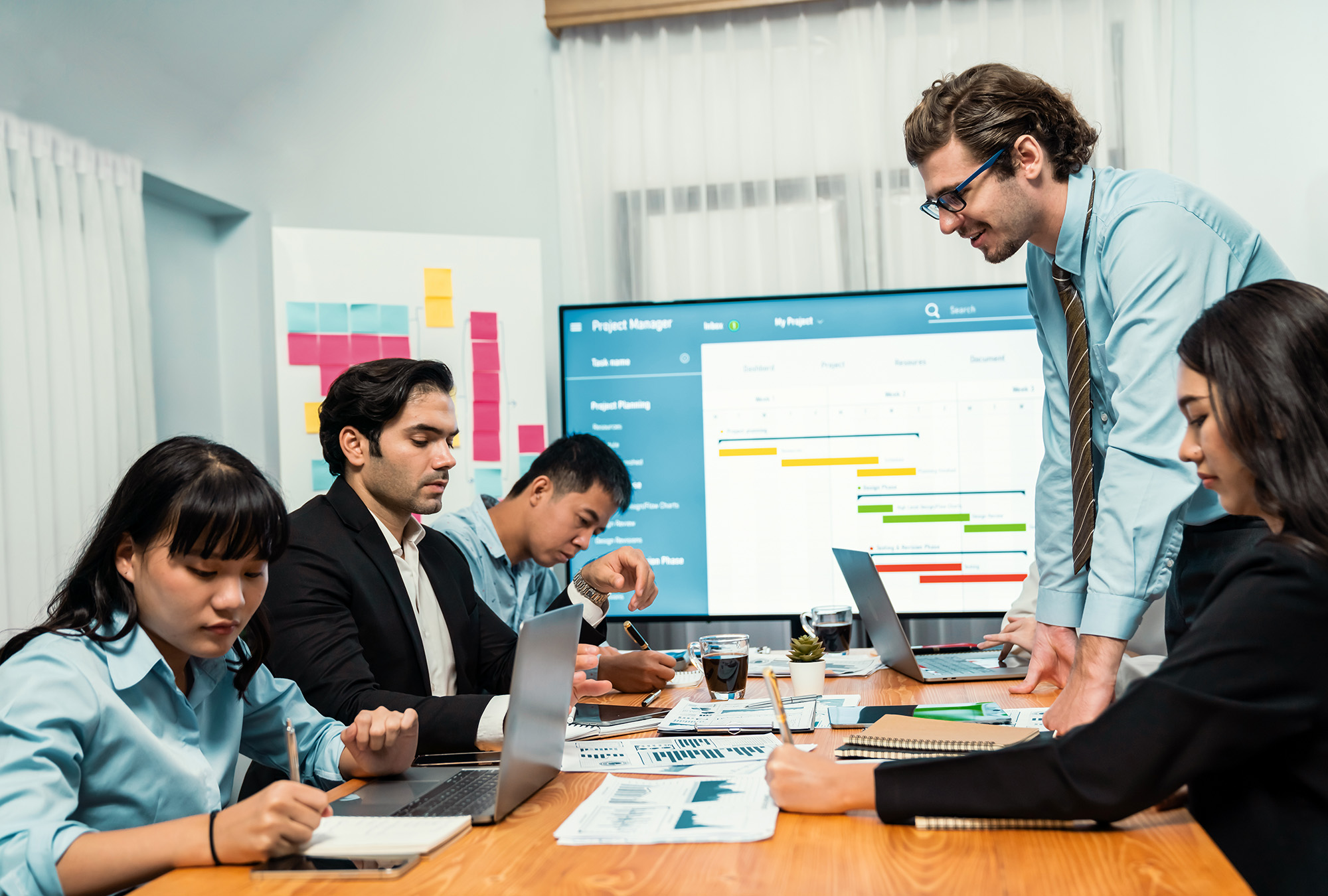 Multi ethnic diversity business people and modern business project. Habiliment