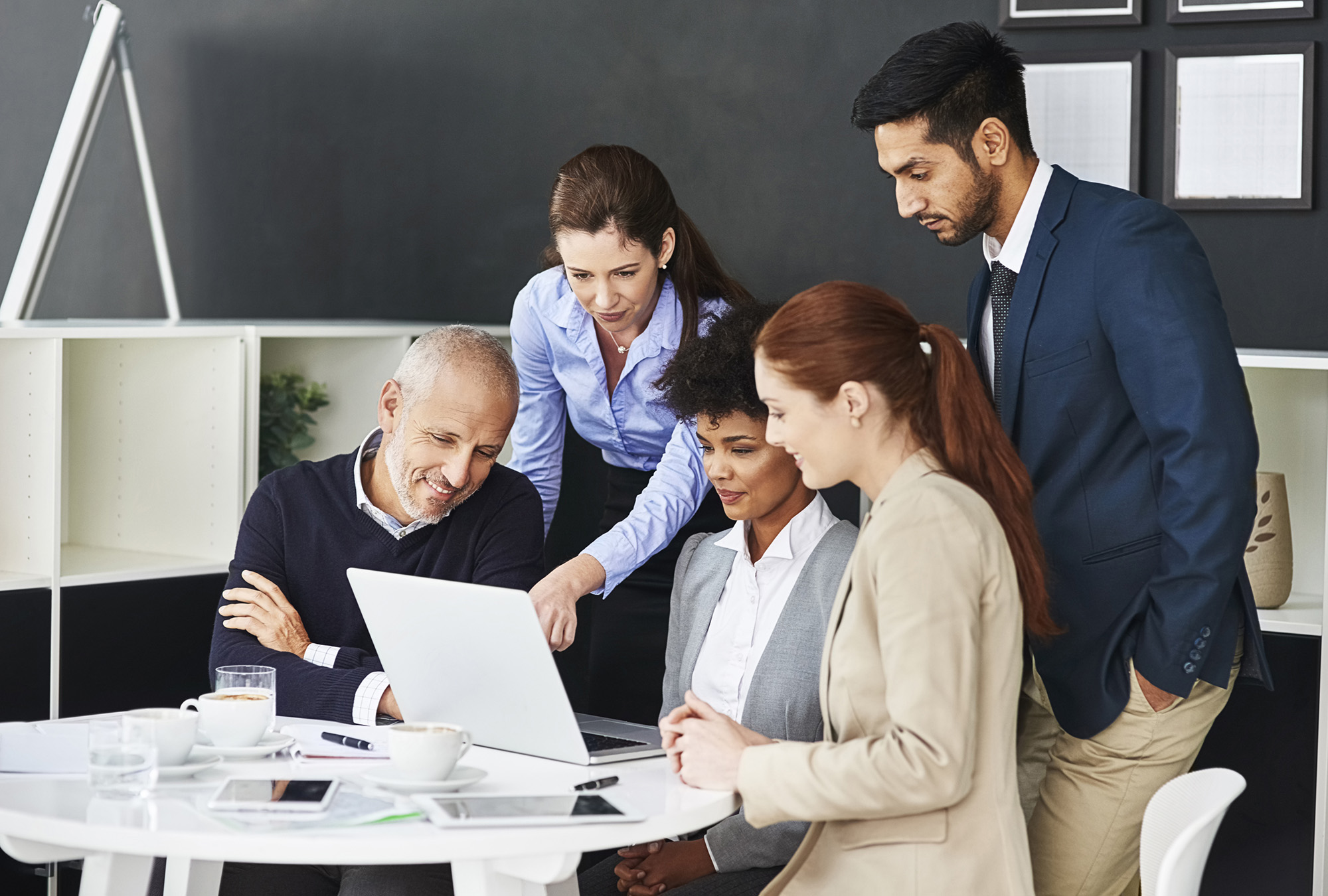 Teamwork, meeting or business people with laptop in office for s